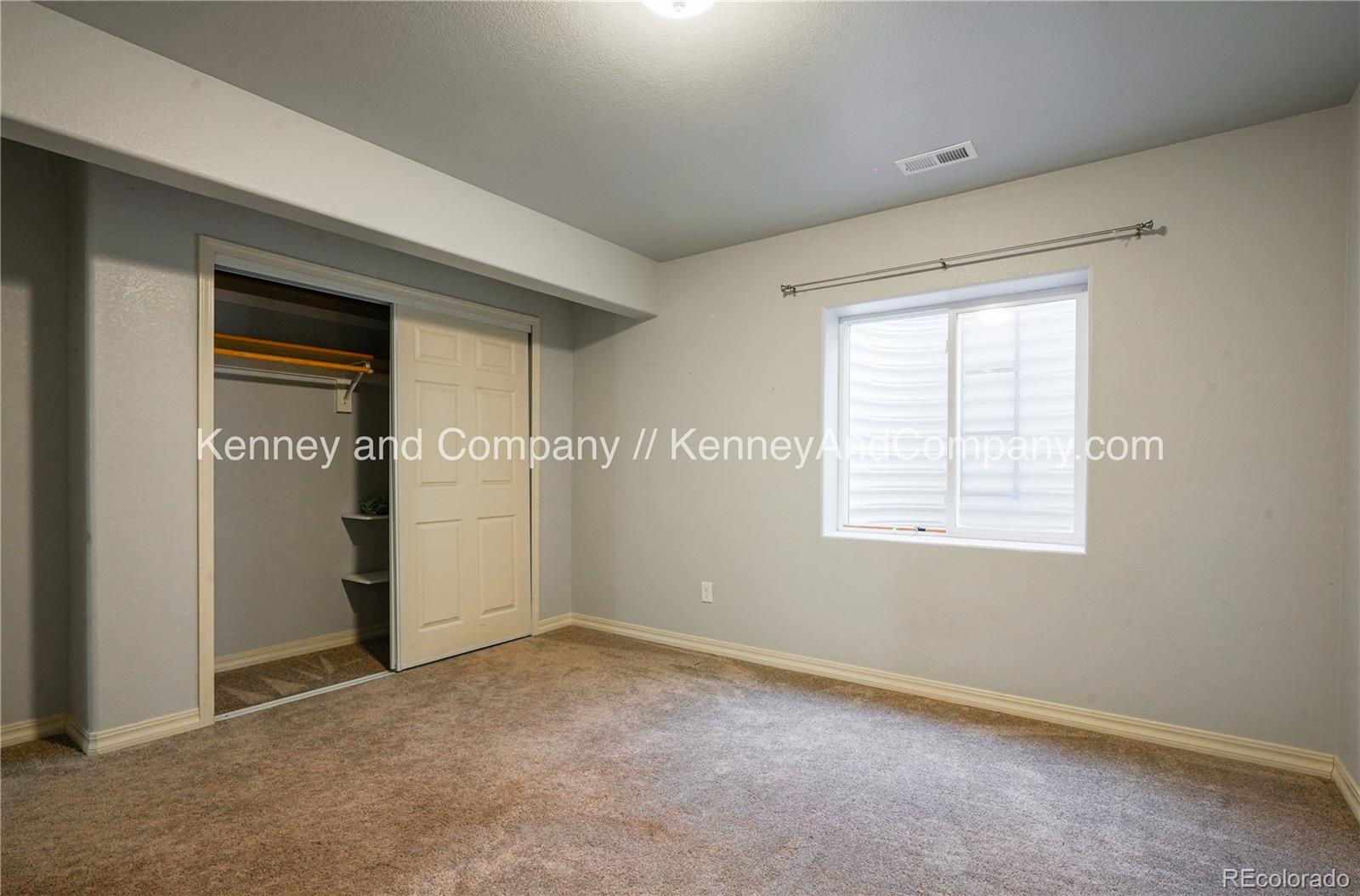 15879 Agate Creek Drive Monument, CO 80132 - Photo 18 of 24 an empty room with windows