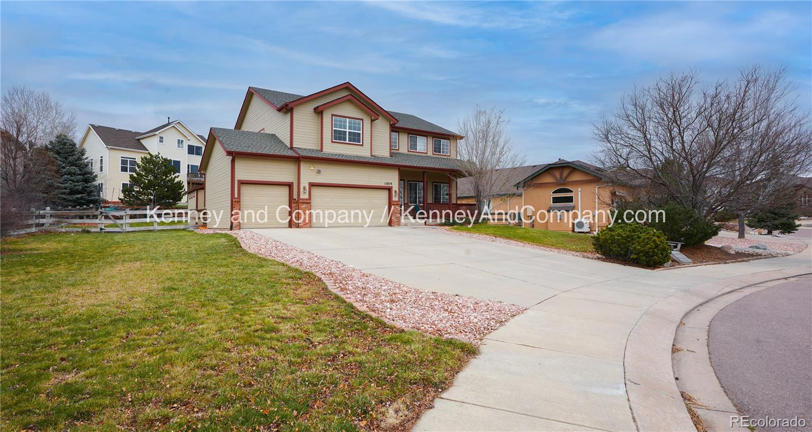 15879 Agate Creek Drive Monument, CO 80132 - Photo 2 of 24 a front view of a house with swimming pool
