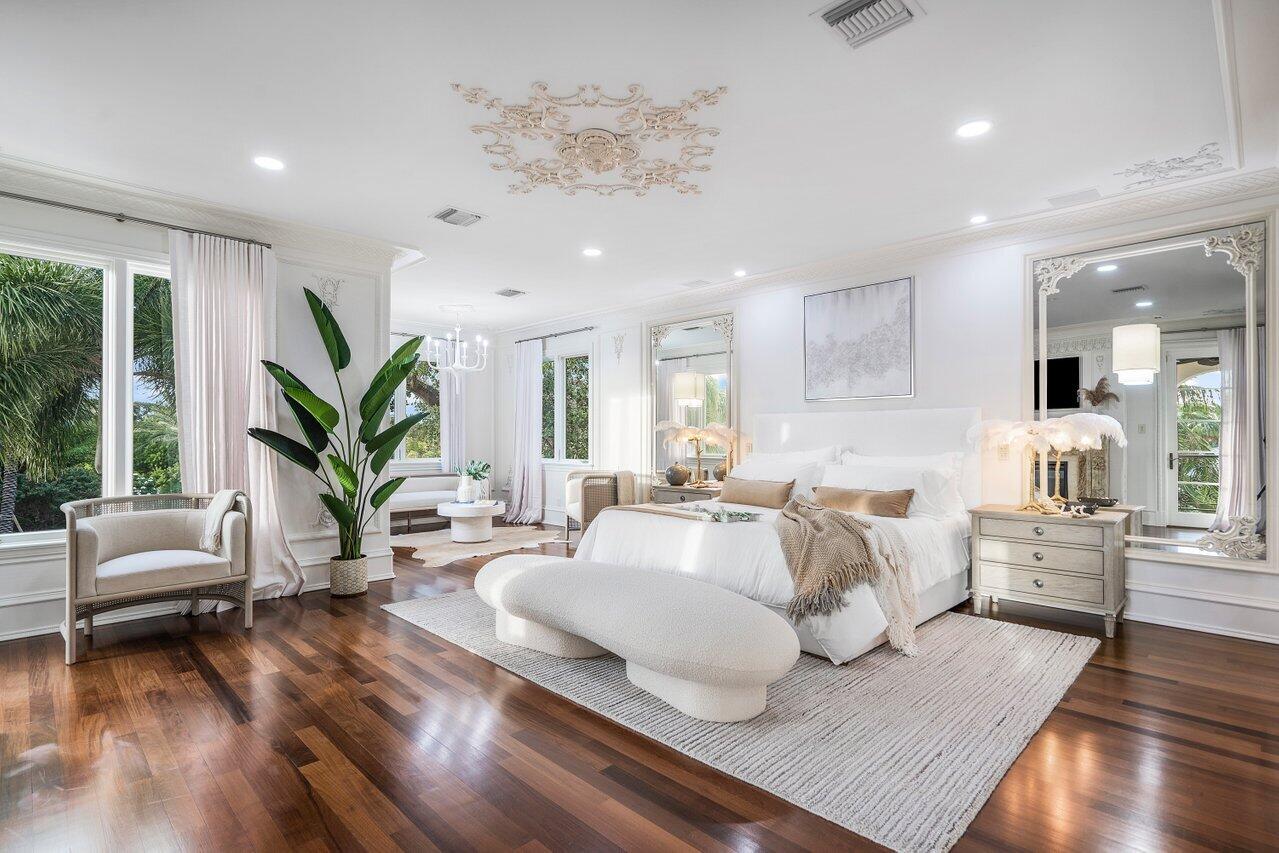 591 Phillips Drive Boca Raton, FL 33432 - Photo 32 of 90 a living room with furniture and a large window