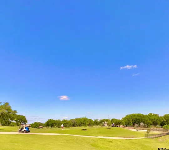 a view of an ocean and a mountain