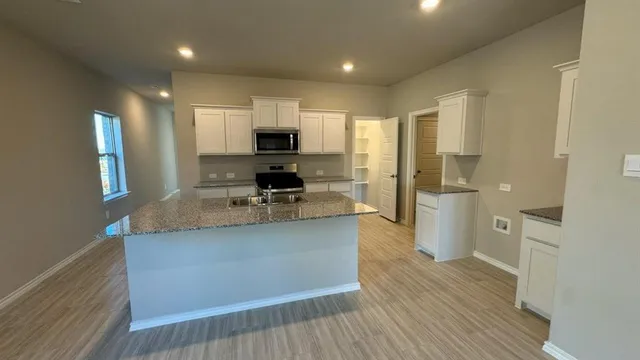 a house view with a backyard space