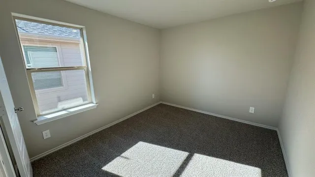 a bathroom with a tub and shower