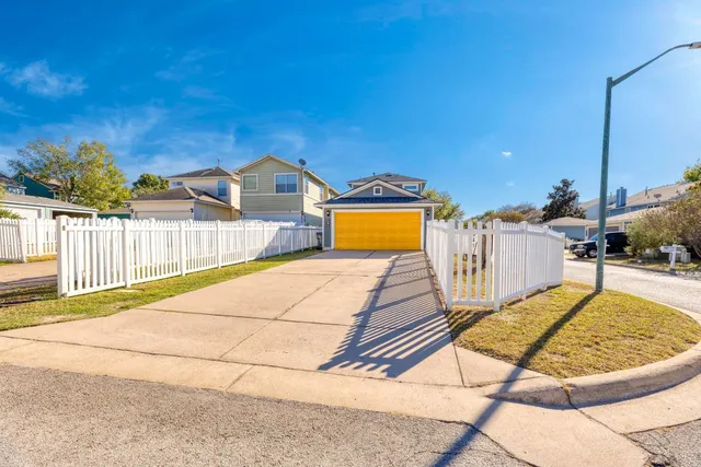 a view of a swimming pool with a lounge chairs