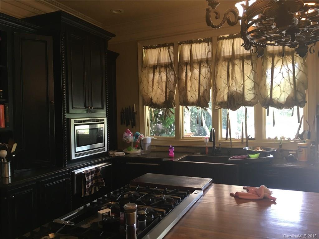 1801 Ruben Road Monroe, NC 28112 - Photo 9 of 14 a kitchen with a large window in it