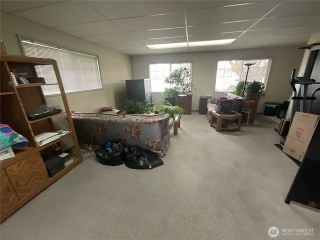 a room with furniture and a window