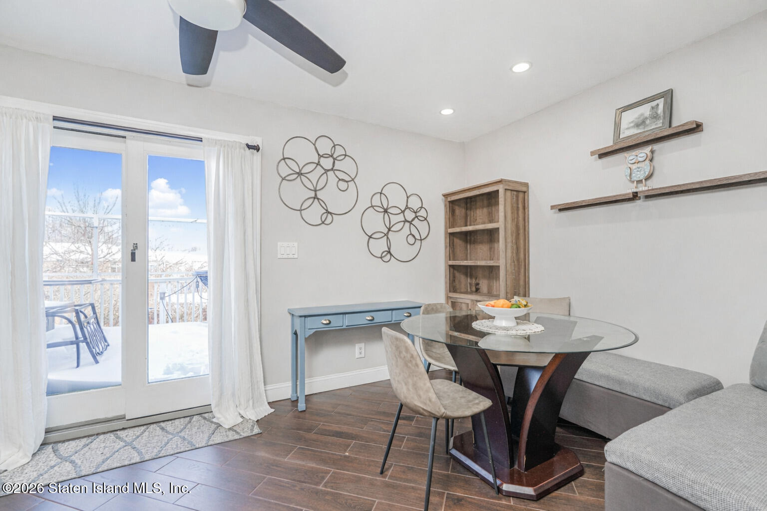 631 Travis Avenue Staten Island, NY 10314 - Photo 14 of 75 a view of a dining room with furniture and a table