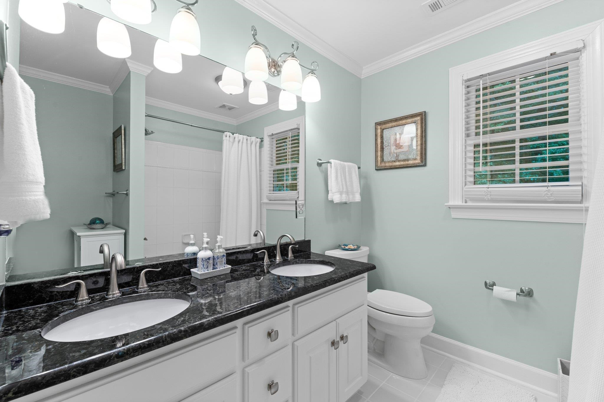 9716 Macon Road Raleigh, NC 27613 - Photo 17 of 28 Upstairs Hall Bath