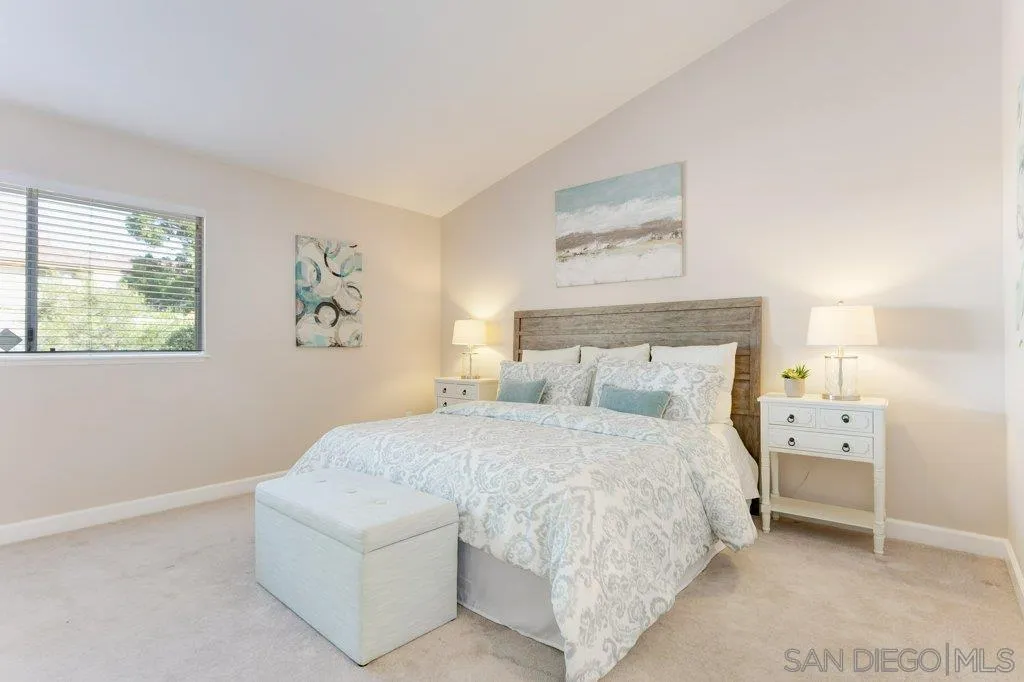 2725 Glasgow Drive Carlsbad, CA 92010 - Photo 13 of 29 a bedroom with a bed and a painting on the wall