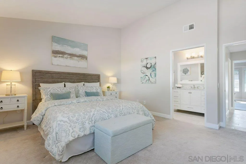 2725 Glasgow Drive Carlsbad, CA 92010 - Photo 14 of 29 a bedroom with a bed and a view of bathroom