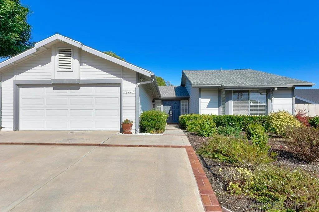 2725 Glasgow Drive Carlsbad, CA 92010 - Photo 2 of 29 a front view of a house with a yard