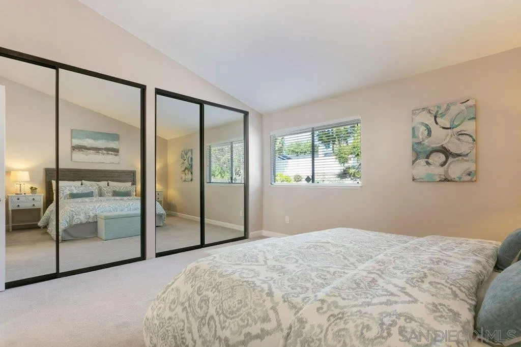2725 Glasgow Drive Carlsbad, CA 92010 - Photo 21 of 29 a bedroom with a balcony and large window