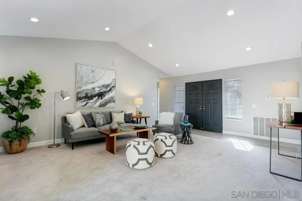 2725 Glasgow Drive Carlsbad, CA 92010 - Photo 5 of 29 a living room with furniture and a potted plant