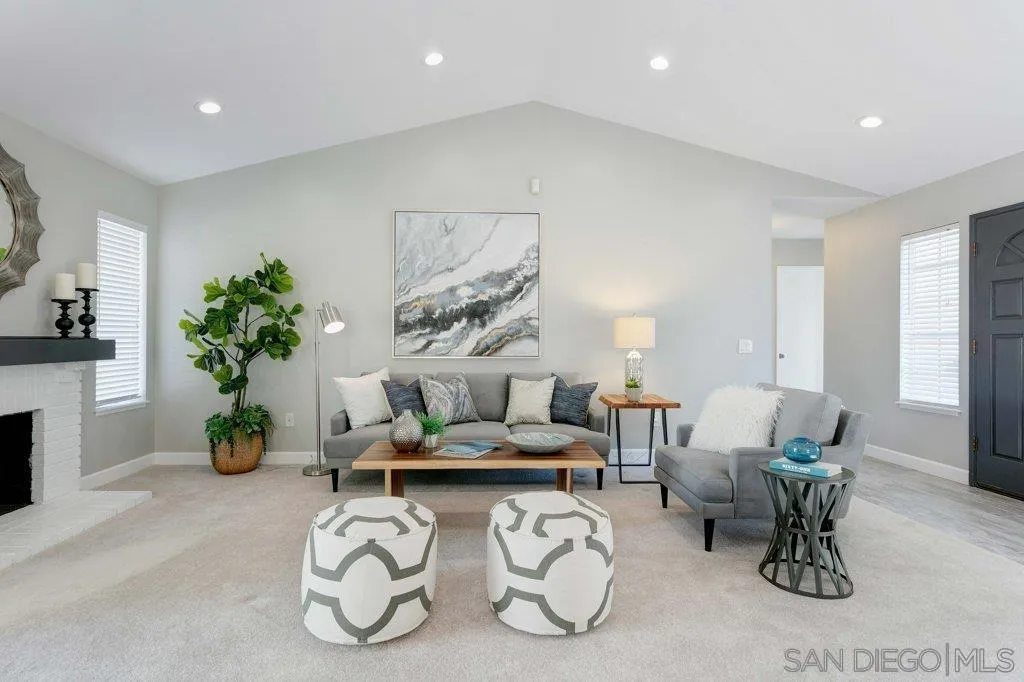 2725 Glasgow Drive Carlsbad, CA 92010 - Photo 6 of 29 a living room with furniture and a potted plant