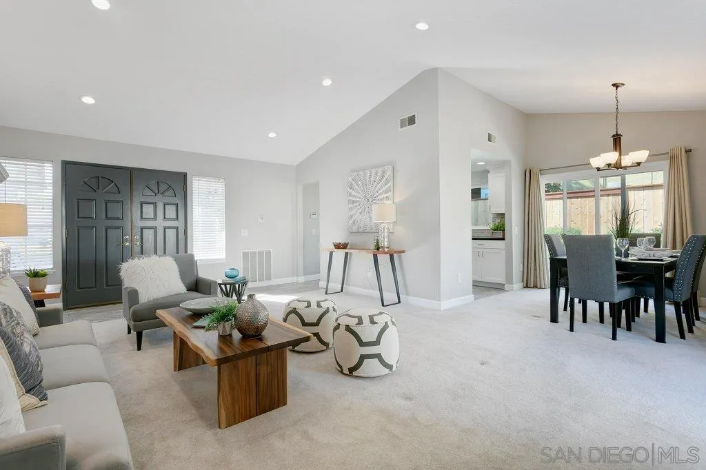 2725 Glasgow Drive Carlsbad, CA 92010 - Photo 9 of 29 a living room with furniture and a chandelier