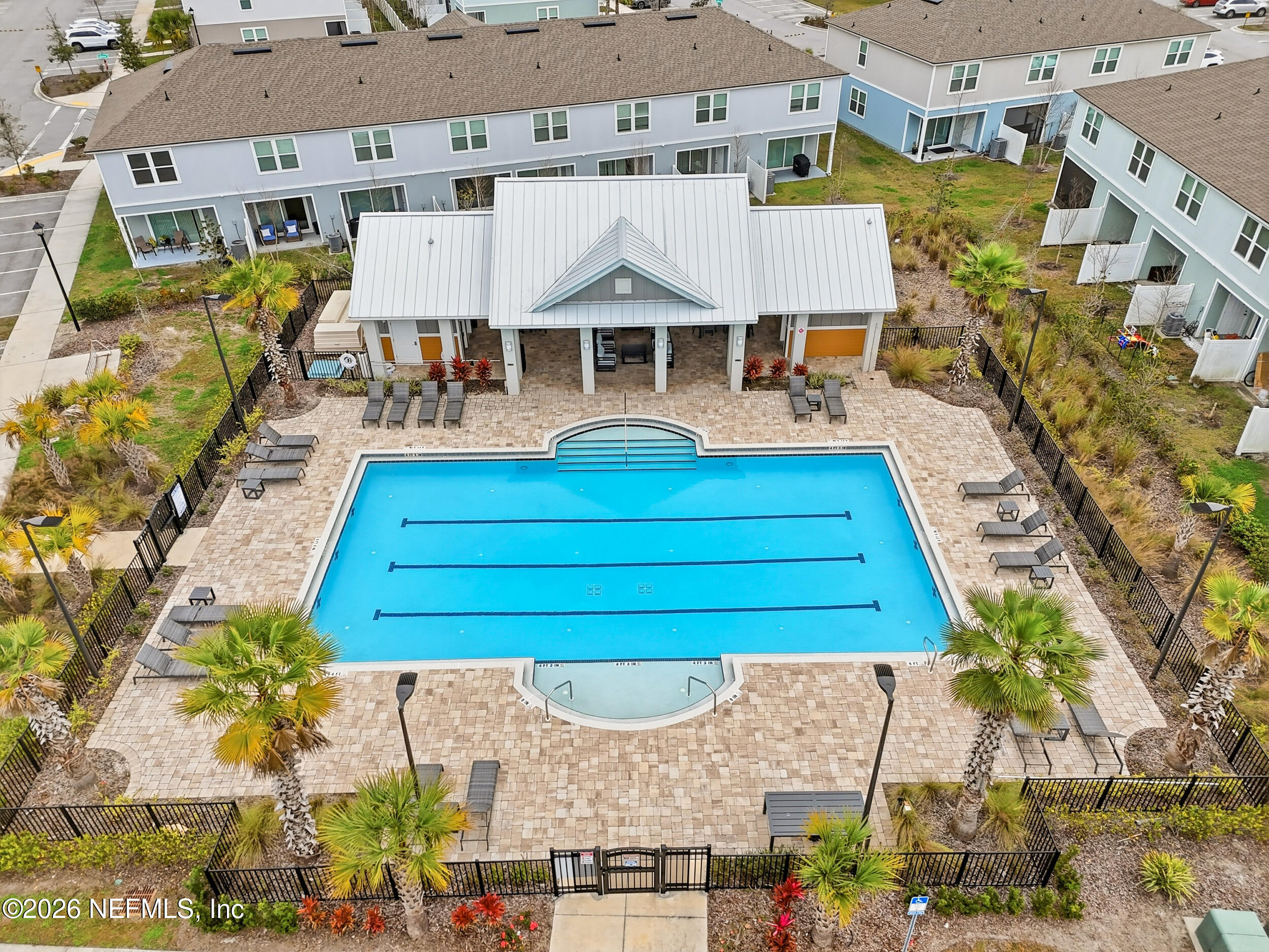 8323 Asteroid Street Jacksonville, FL 32256 - Photo 24 of 27 an aerial view of a house with table and chairs