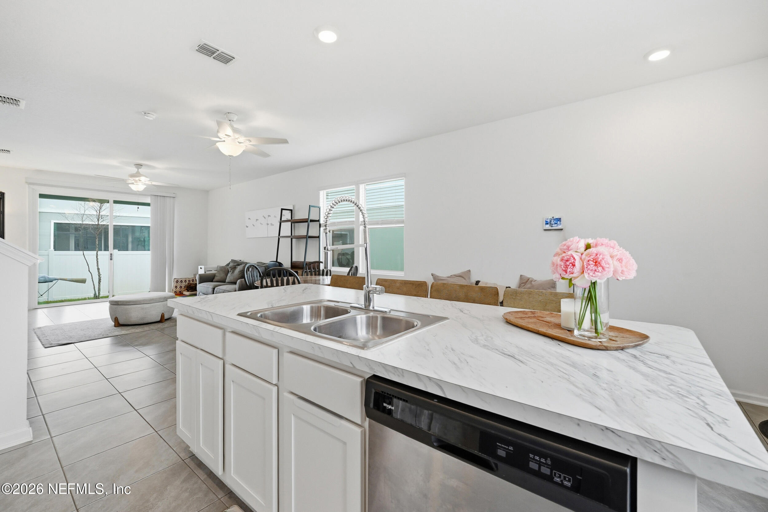 8323 Asteroid Street Jacksonville, FL 32256 - Photo 4 of 27 a kitchen with a sink and stove