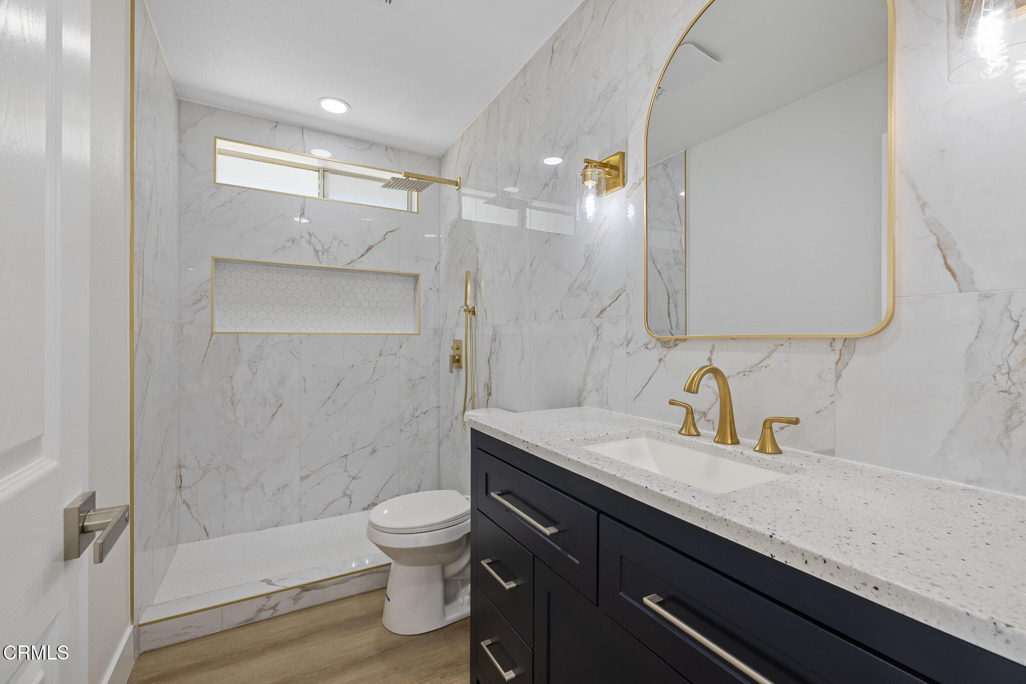 6015 Peppertree Lane Simi Valley, CA 93063 - Photo 11 of 15 a bathroom with a sink a toilet and shower