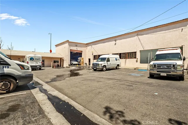 a view of a cars park in front of house