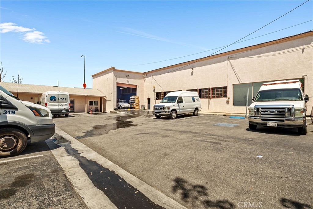 484 East Redlands Boulevard San Bernardino, CA 92408 - Photo 16 of 27 a view of a cars park in front of house