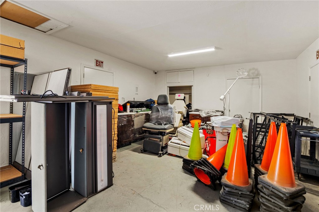 484 East Redlands Boulevard San Bernardino, CA 92408 - Photo 19 of 27 a view of walk in closet with clothes and shoes