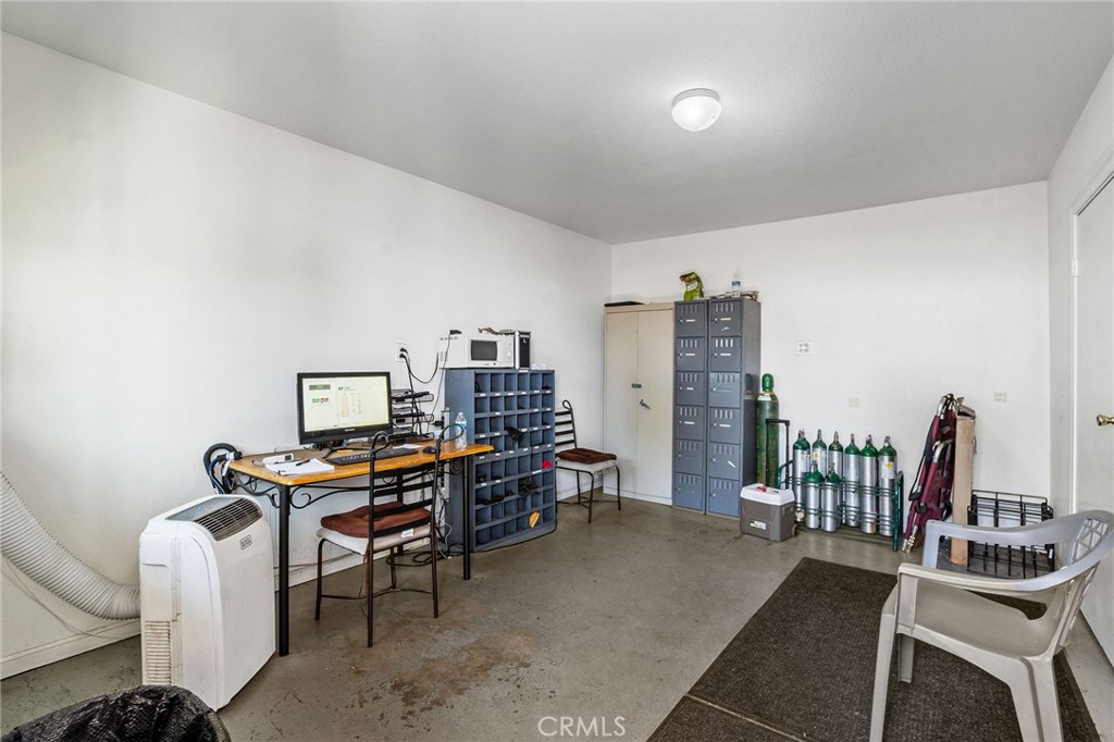 484 East Redlands Boulevard San Bernardino, CA 92408 - Photo 20 of 27 a view of a workspace with furniture and toys