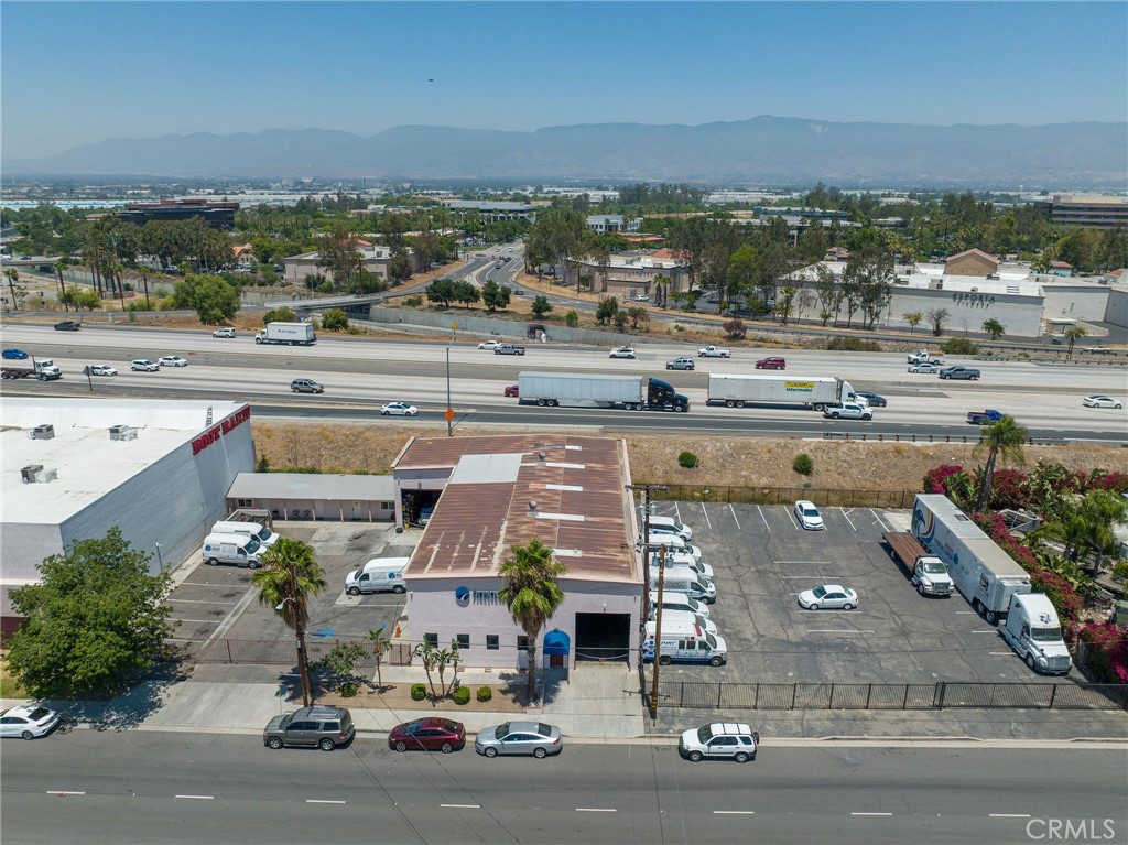 484 East Redlands Boulevard San Bernardino, CA 92408 - Photo 2 of 27 an aerial view of a parking
