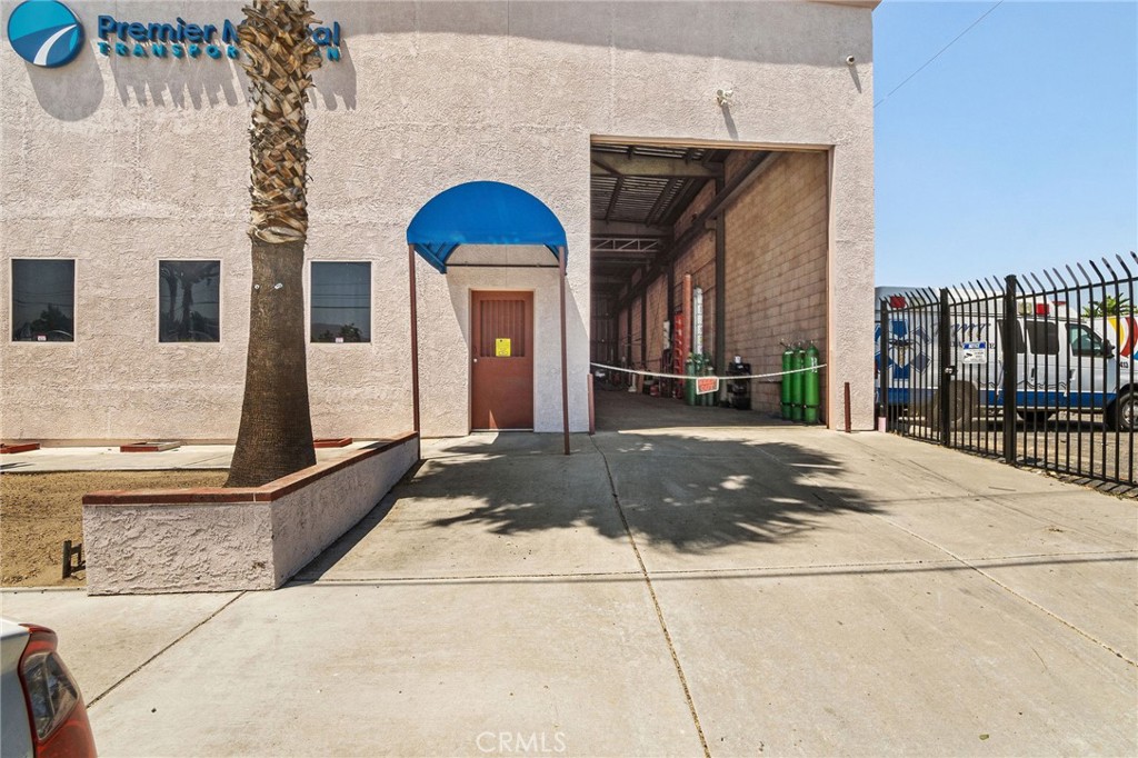 484 East Redlands Boulevard San Bernardino, CA 92408 - Photo 24 of 27 a view of a house with a yard
