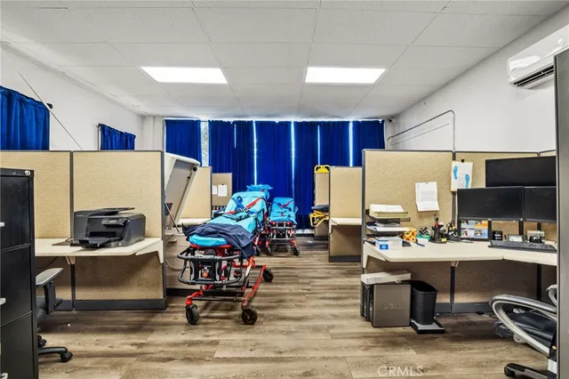 a living room with lots of furniture and appliances