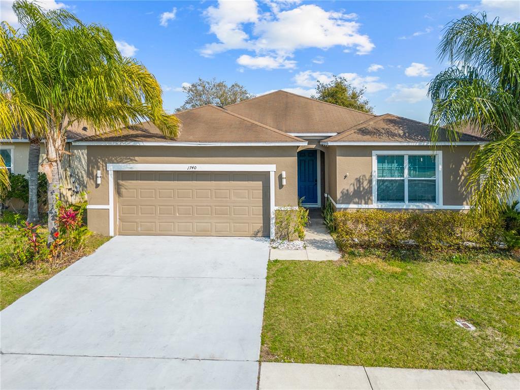 front view of house with a yard