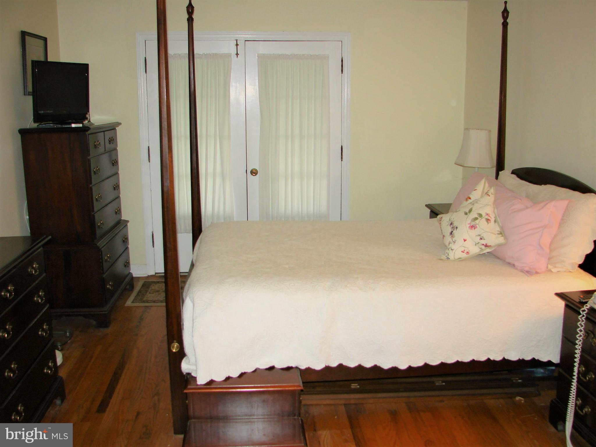 4 Brookside Circle Wayne, PA 19087 - Photo 9 of 25 Master Bedroom with French doors to the balcony