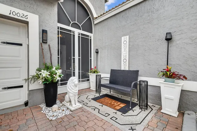a view of a workspace with furniture
