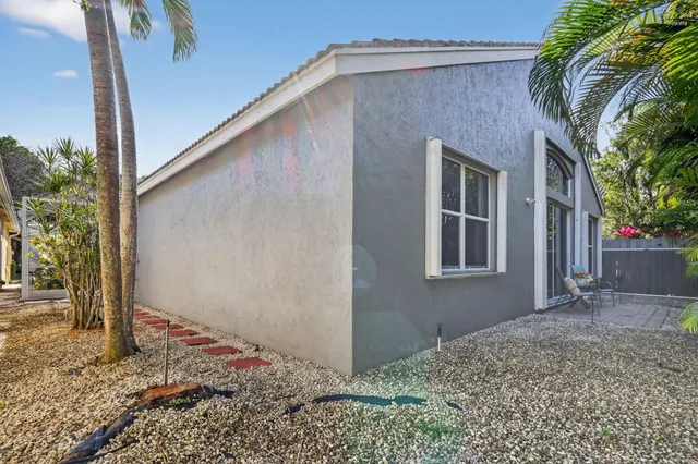 a backyard of a house with lots of green space