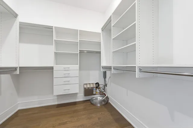 a view of an empty walk in closet