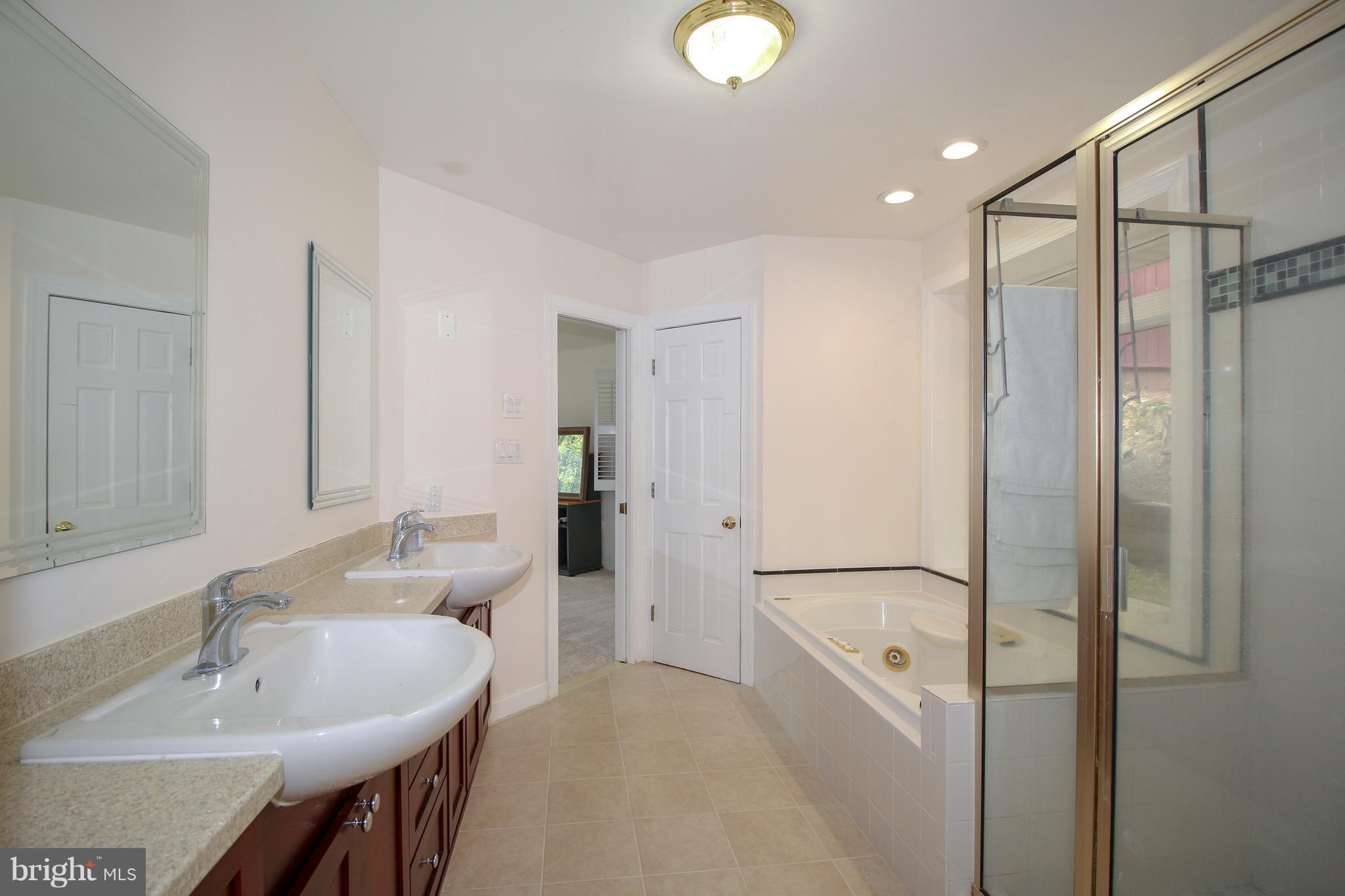 2038 Carrhill Road Vienna, VA 22181 - Photo 16 of 29 Updated Master bathroom w/walk-in closet