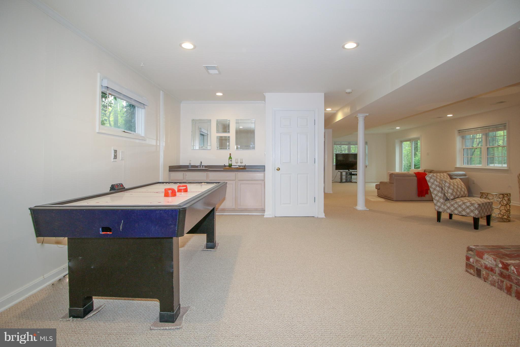 2038 Carrhill Road Vienna, VA 22181 - Photo 24 of 29 Game room area and wet bar in den