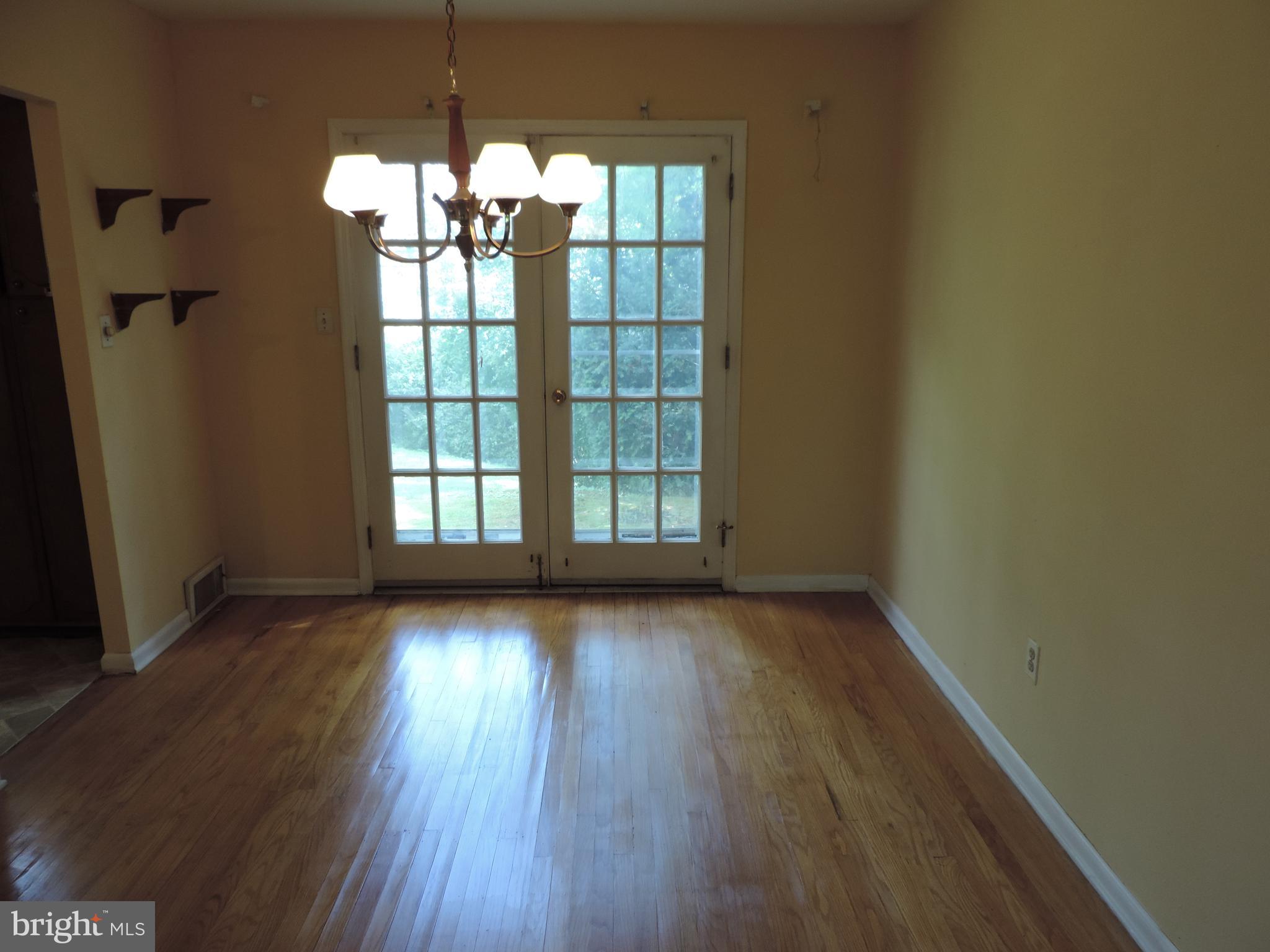 1907 Scott Road Oreland, PA 19075 - Photo 13 of 30 dining room with double door to back yard