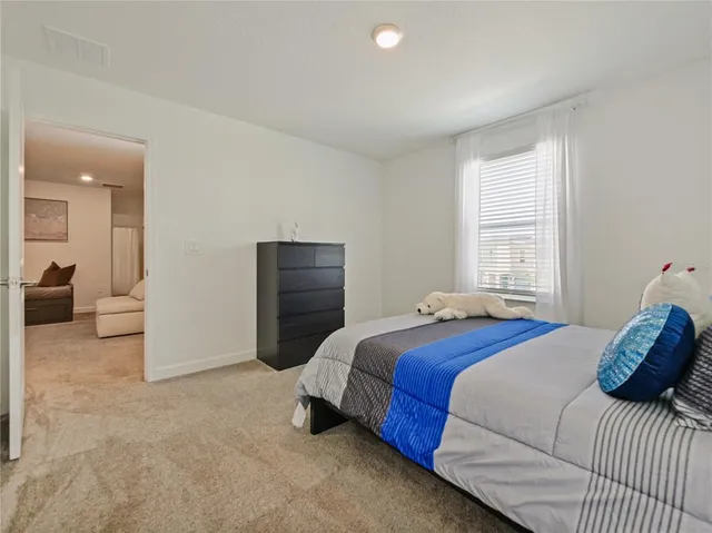 a view of a swimming pool with a porch