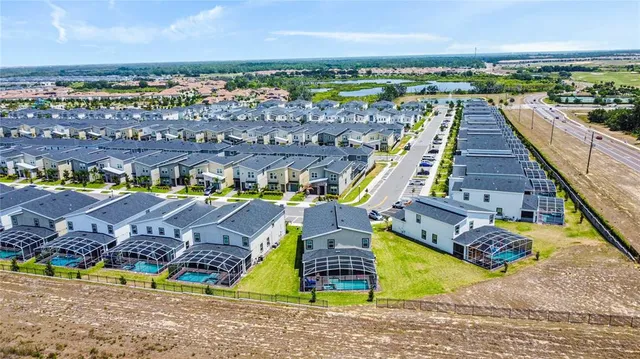 a view of a city with lawn chairs