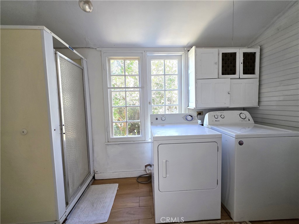 1414 Marin Street Corning, CA 96021 - Photo 28 of 43 a utility room with dryer and washer