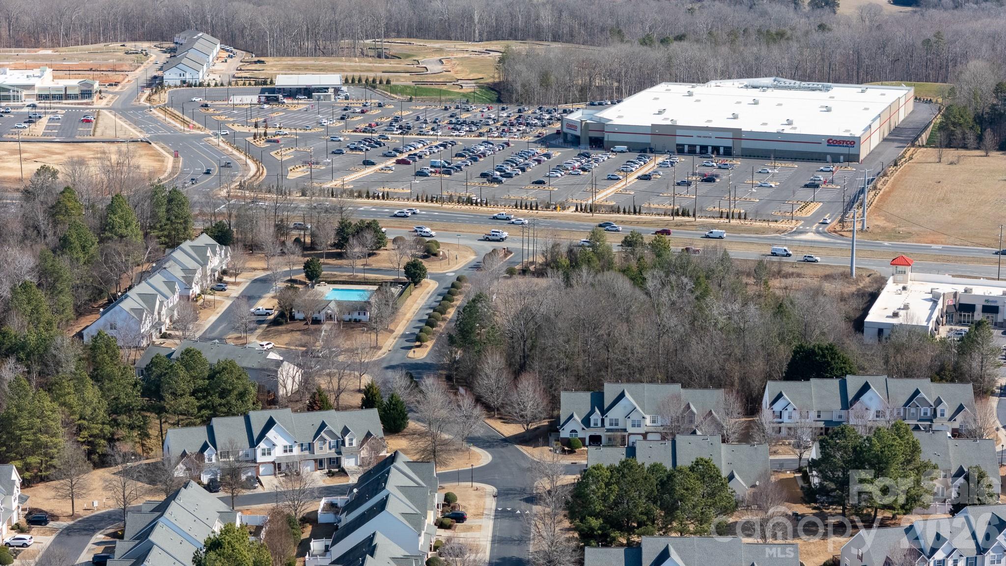 7383 Sun Dance Drive Fort Mill, SC 29707 - Photo 31 of 32 a view of multiple houses with outdoor space