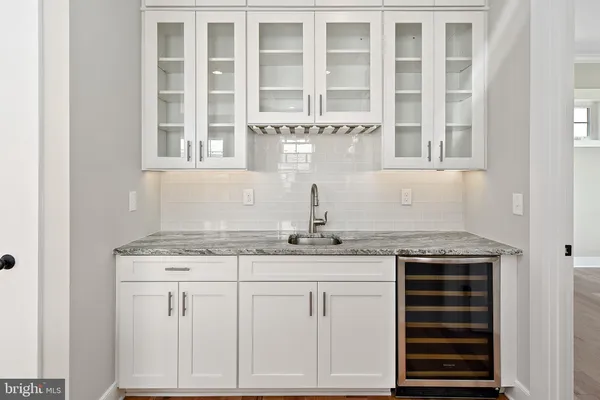 a view of cabinets with granite countertop cabinets
