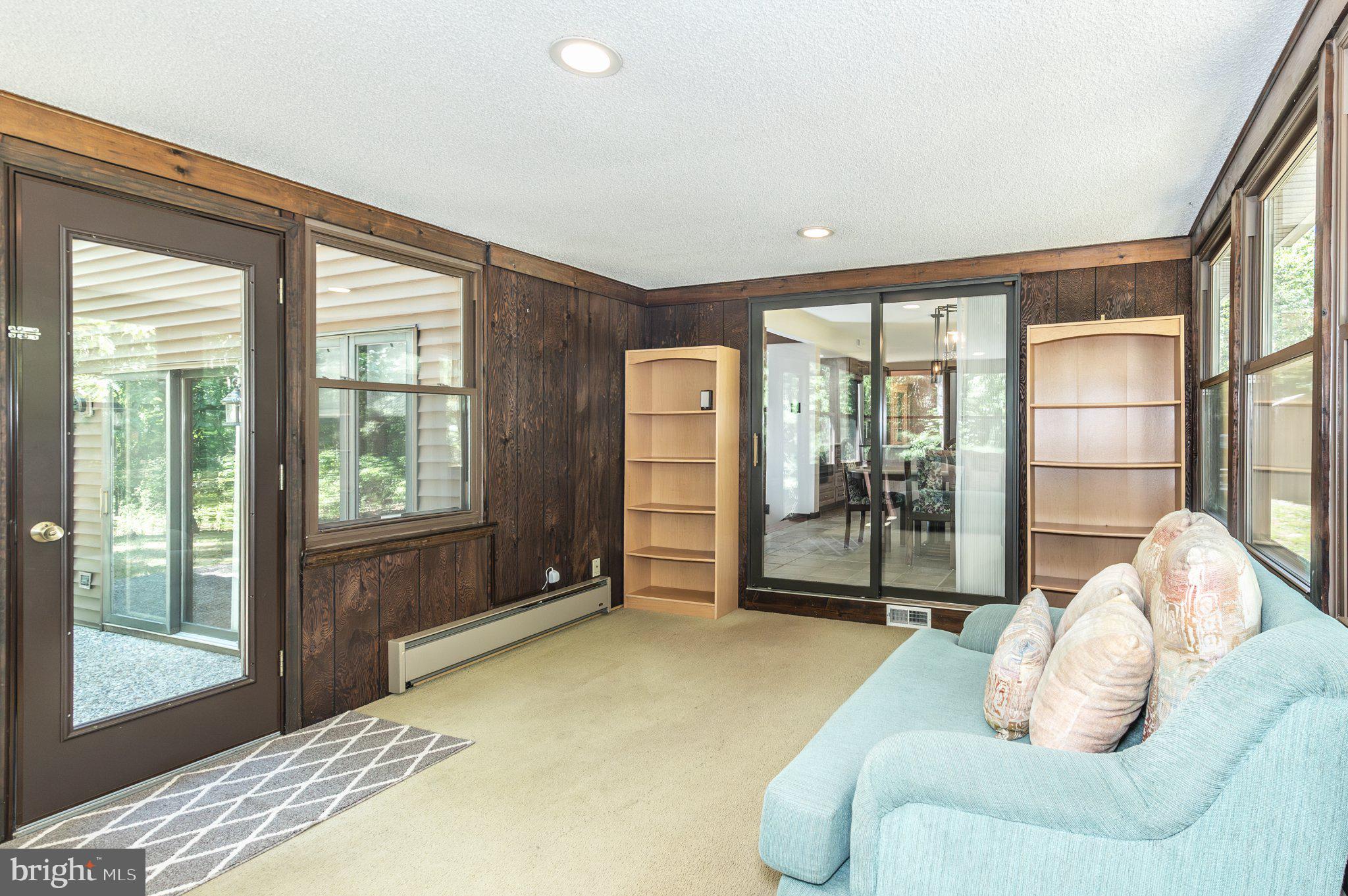 434 4th Street Atco, NJ 08004 - Photo 64 of 69 a bedroom with a bed and glass windows