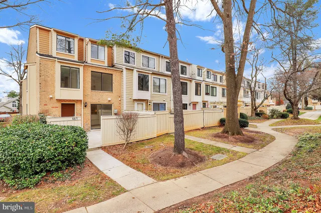 a front view of a building with street view