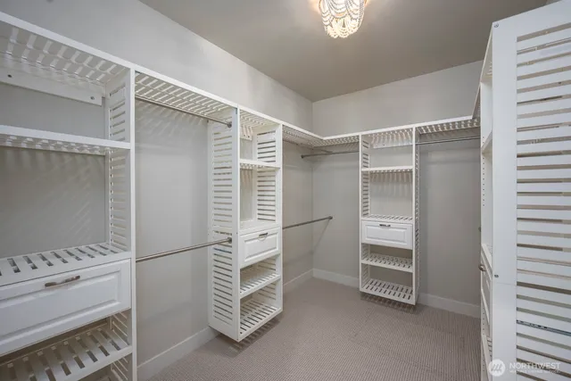 a view of a swimming pool with a chairs