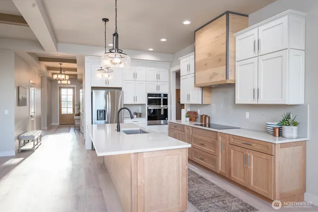 a bathroom with a window and a shower