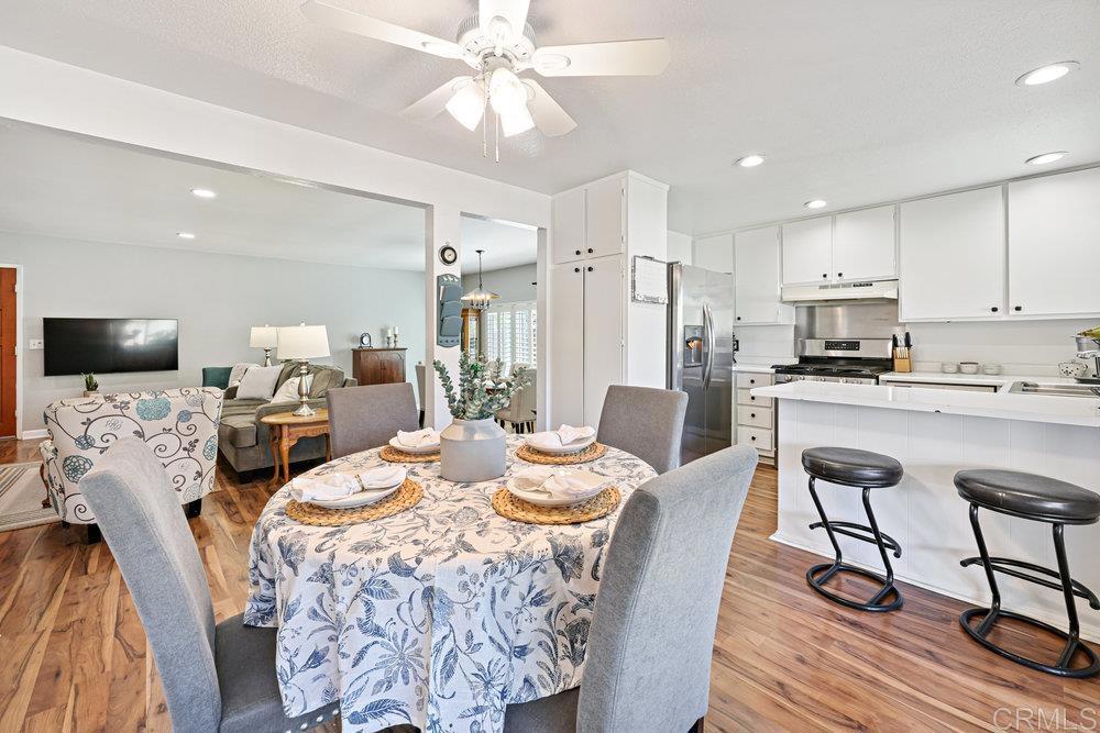 8450 Carlton Oaks Drive Santee, CA 92071 - Photo 11 of 30 a view of a dining room with furniture