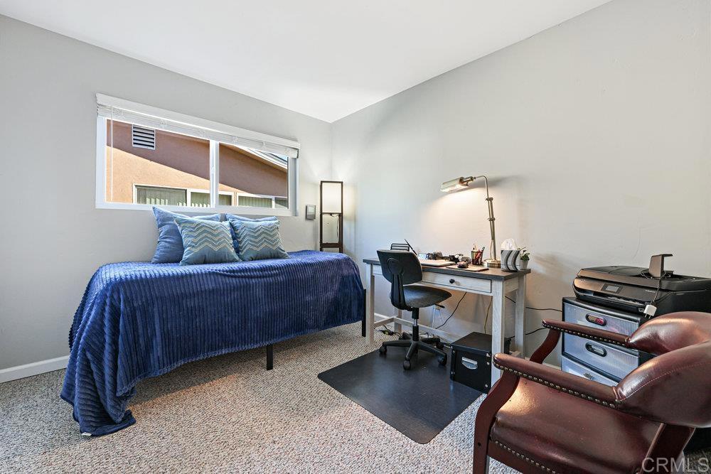 8450 Carlton Oaks Drive Santee, CA 92071 - Photo 23 of 30 a bedroom with furniture and a window