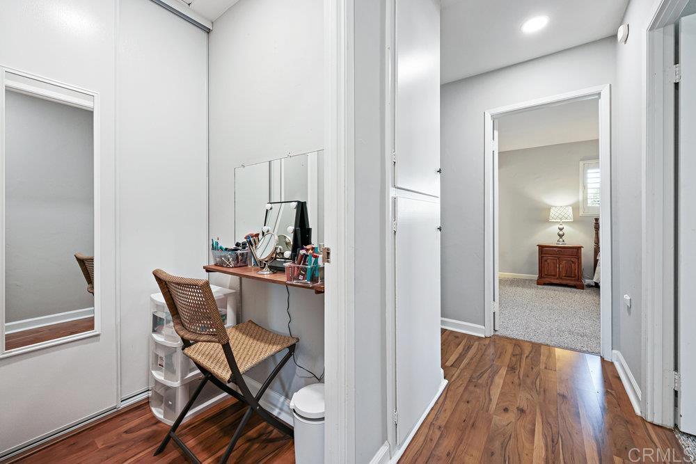 8450 Carlton Oaks Drive Santee, CA 92071 - Photo 24 of 30 a view of a dining room with furniture and wooden floor