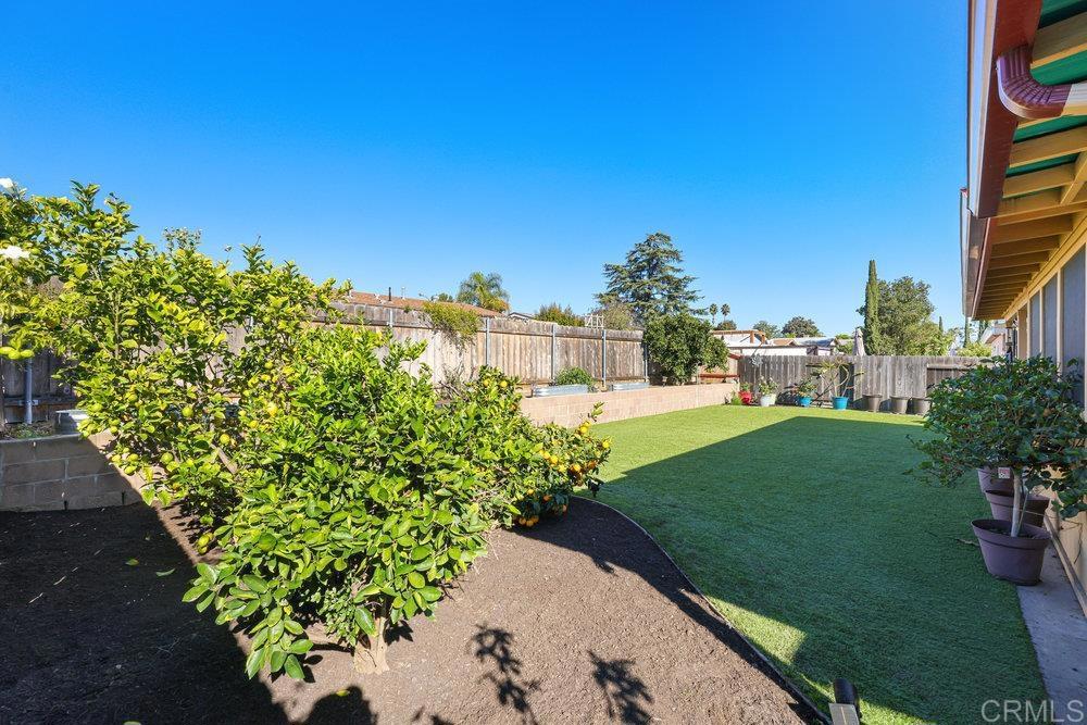 8450 Carlton Oaks Drive Santee, CA 92071 - Photo 25 of 30 a view of a garden with a fountain