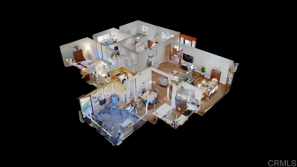 8450 Carlton Oaks Drive Santee, CA 92071 - Photo 30 of 30 a large stone with a vase of flowers on a table